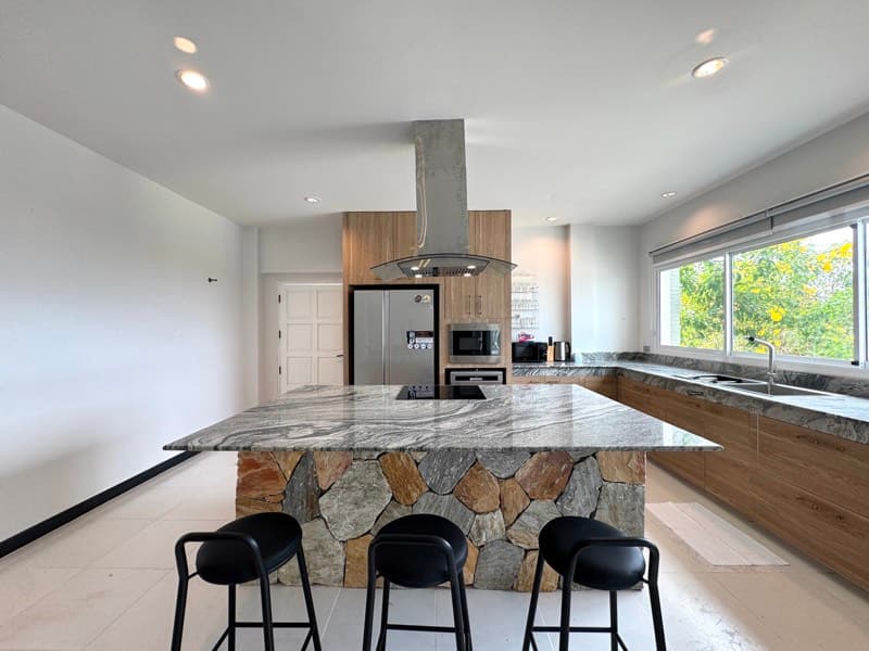 Kitchen island with bar stools