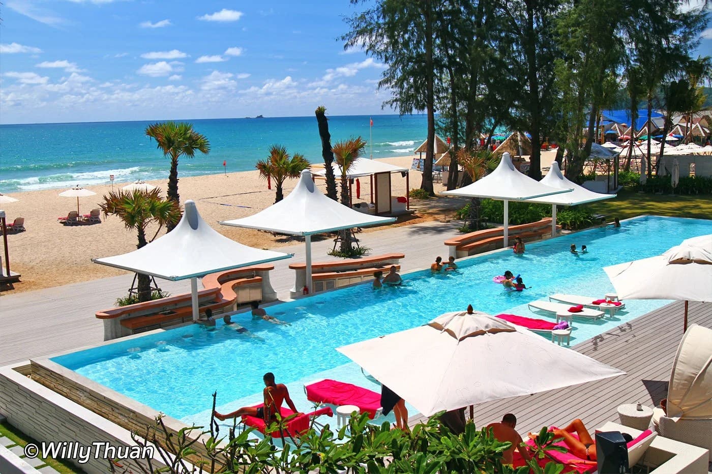 XANA Beach Club: the pool by the sand with cabanas