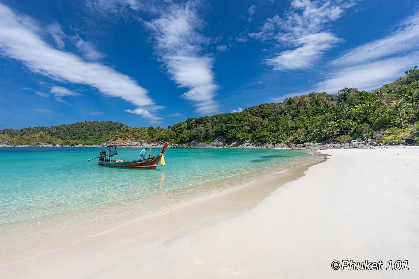 the long white sand, a longtail at the shore