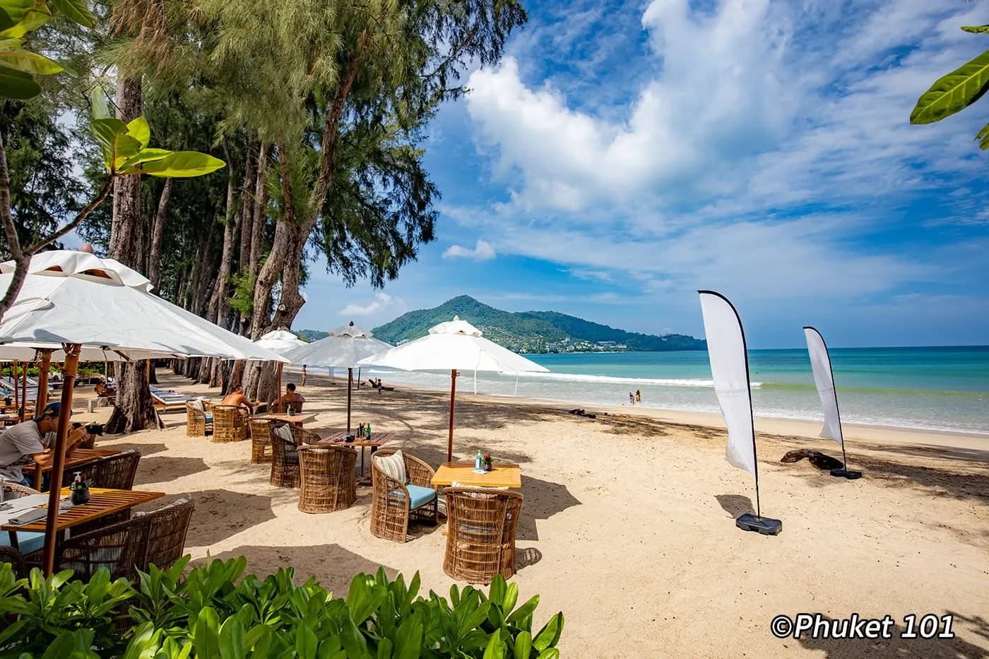 beachfront seating, the hills behind