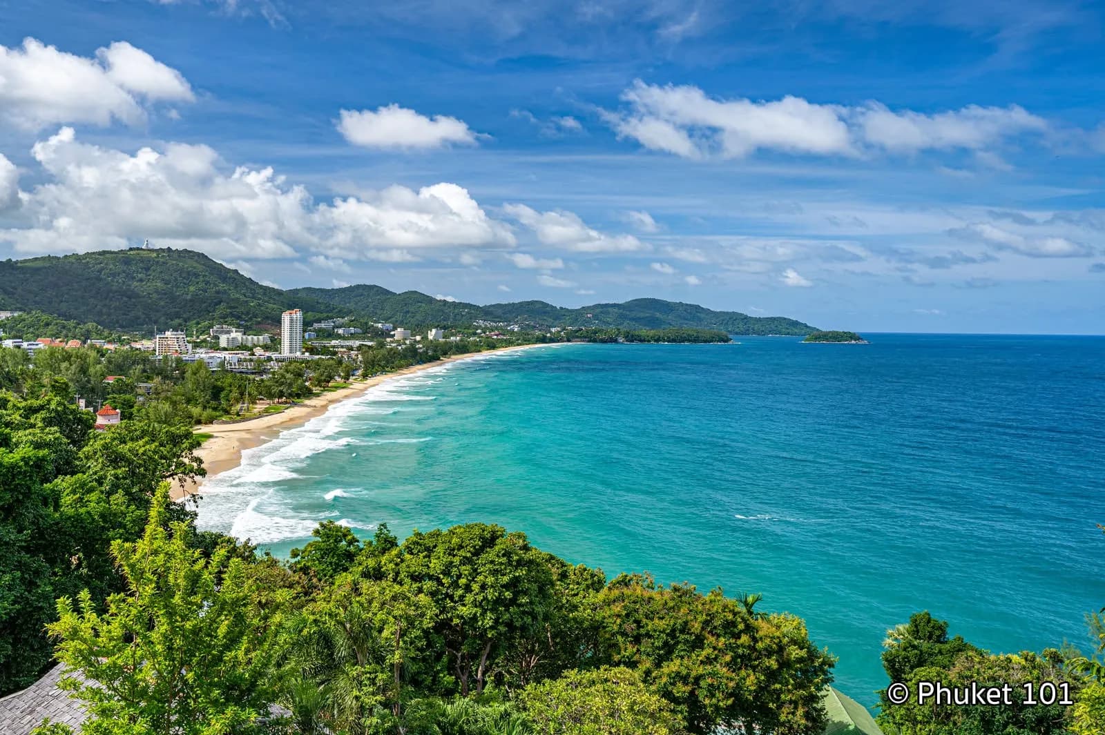 the bay and the turquoise water from the hill