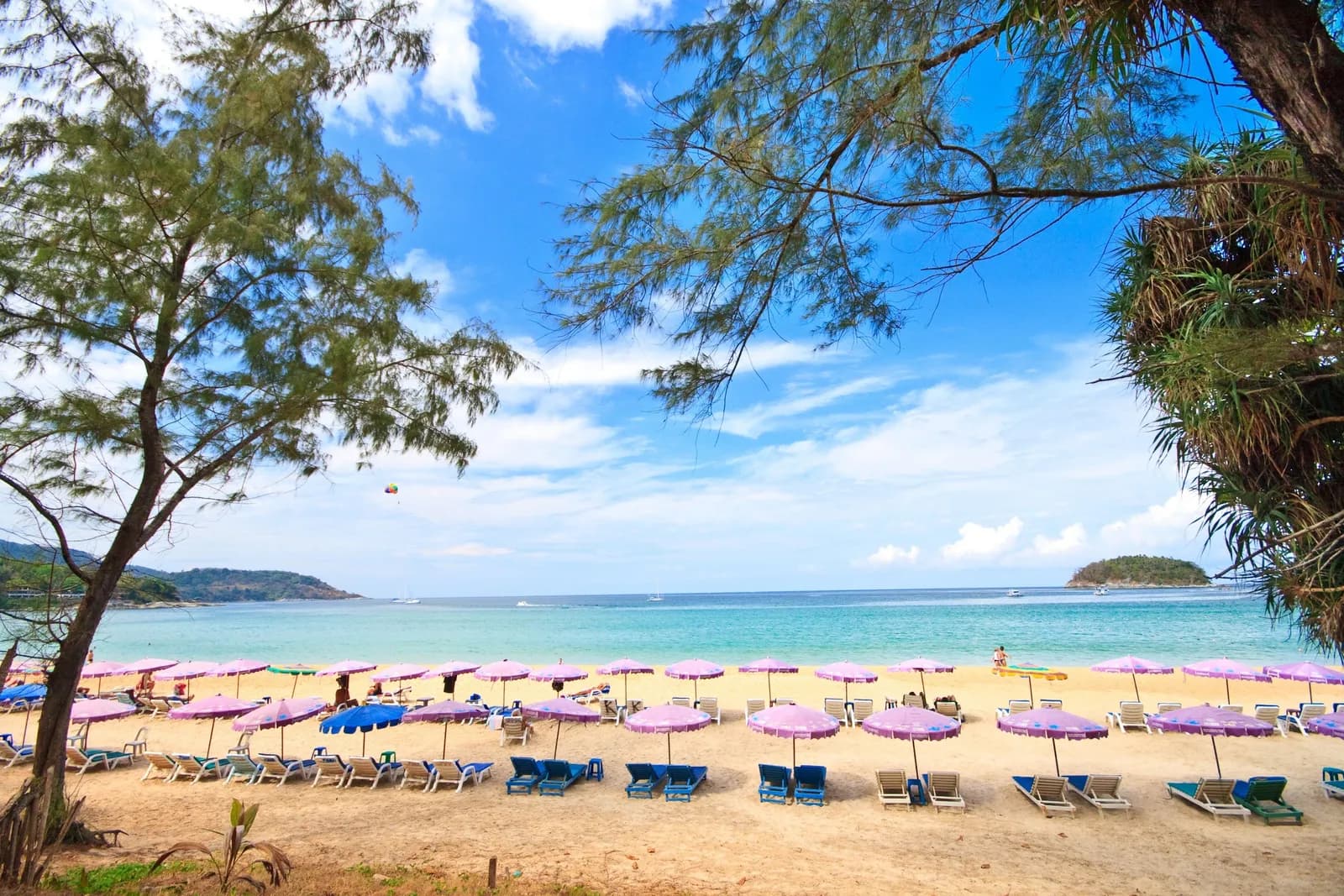 the beach with umbrellas, Koh Pu offshore