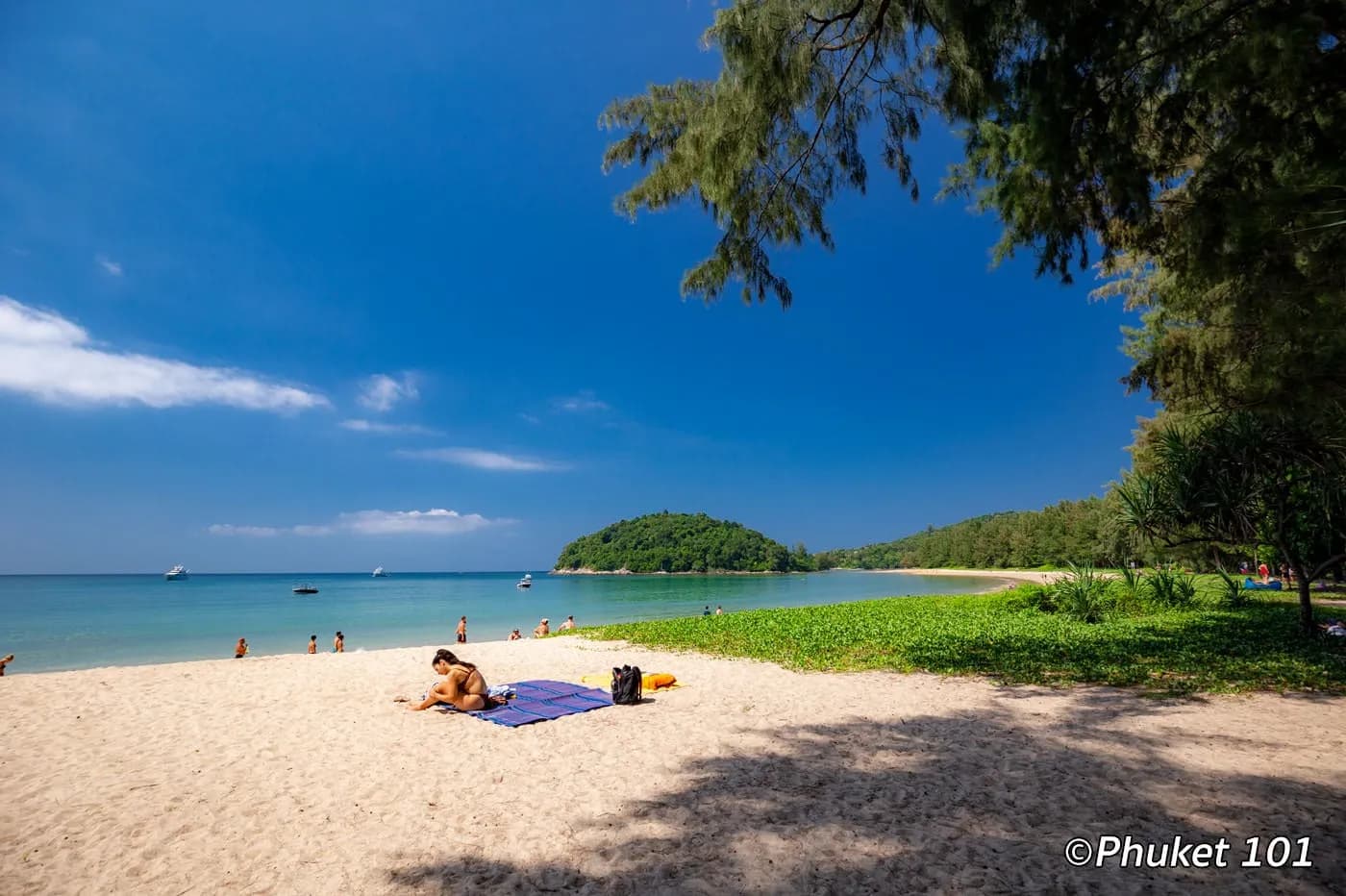 sand and calm water, the islet offshore