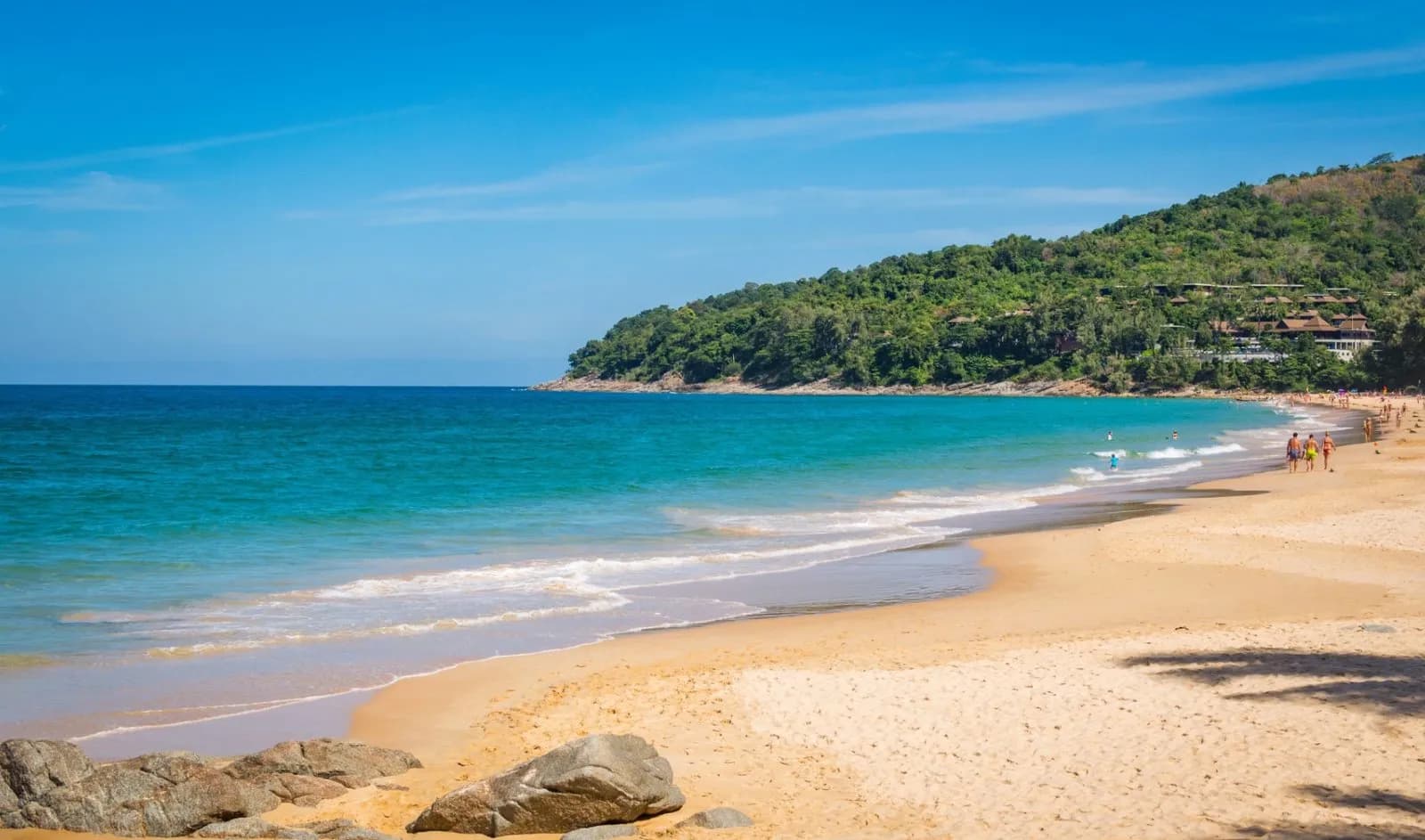 the bay's clear water and the headland