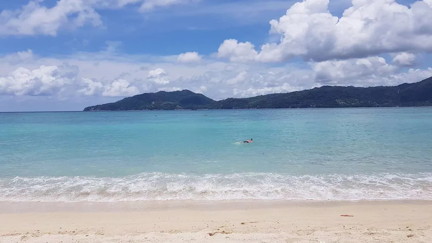 the sand, the water and the Patong headland