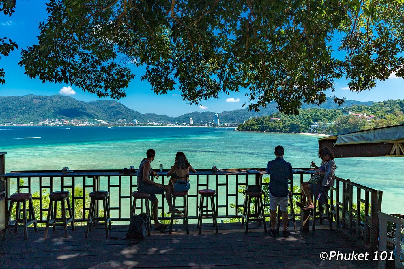 a beach bar terrace over the water